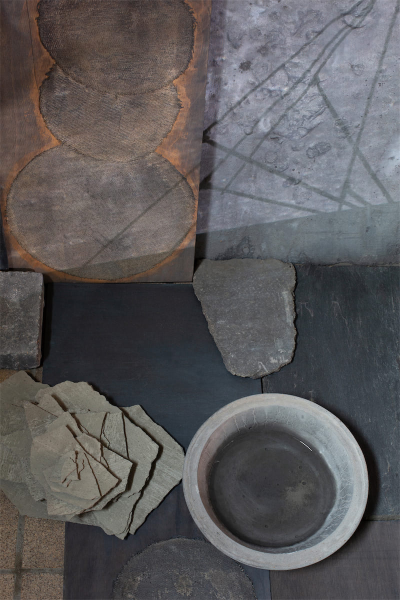 installation view sculptural moving image collaged installation with single channel 4K video projection, paint, linen, wood, stainless steel, nylon, concrete, water, stone slate