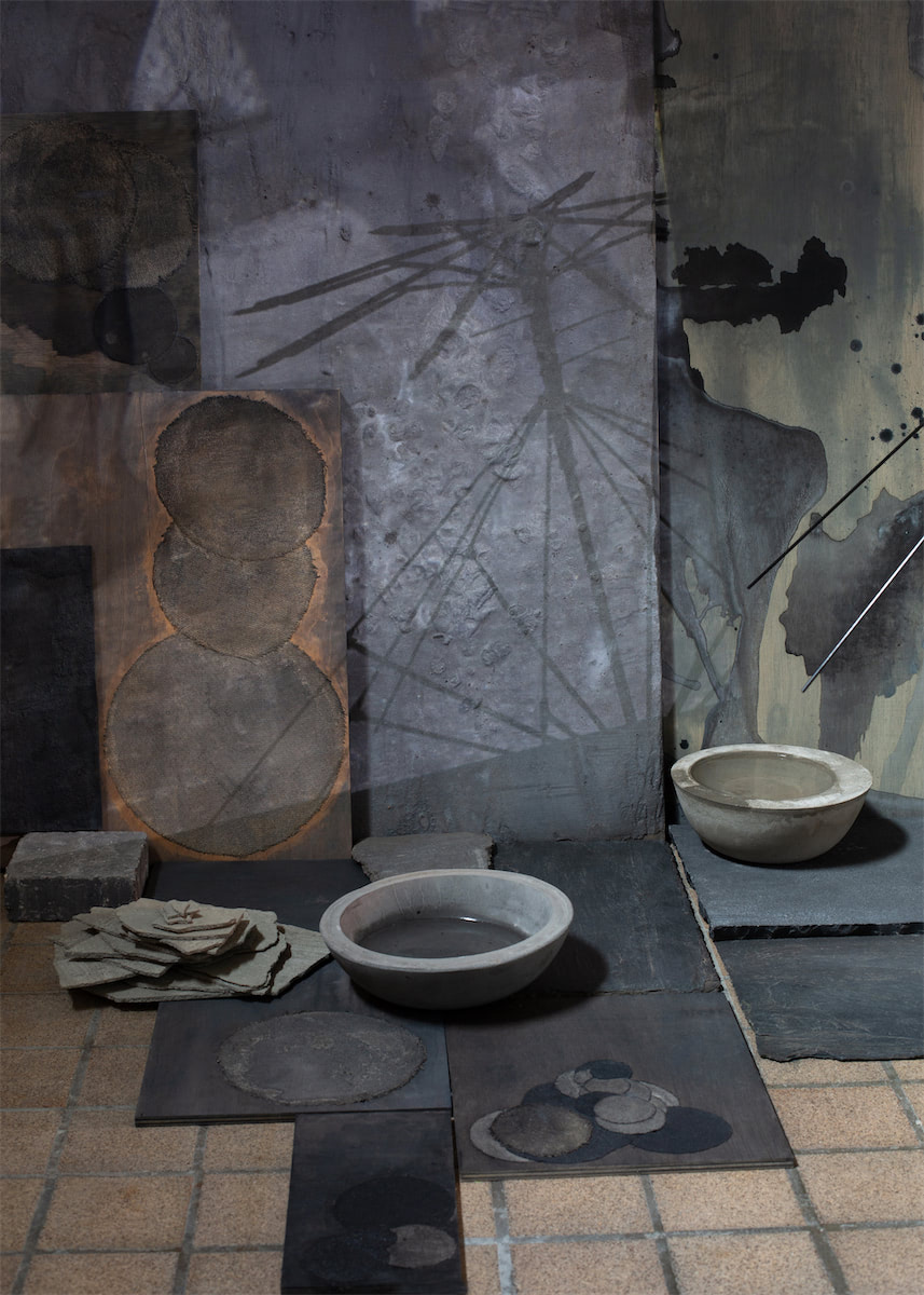 installation view sculptural moving image collaged installation with single channel 4K video projection, paint, linen, wood, stainless steel, nylon, concrete, water, stone slate